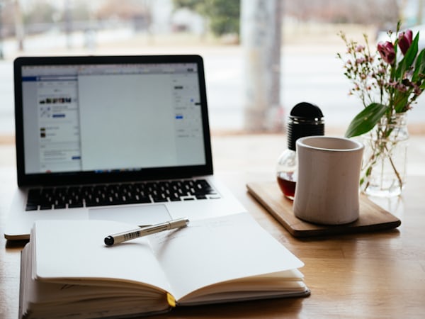 Laptop and workspace — online sourcing and planning for Amazon FBA online arbitrage in the UK